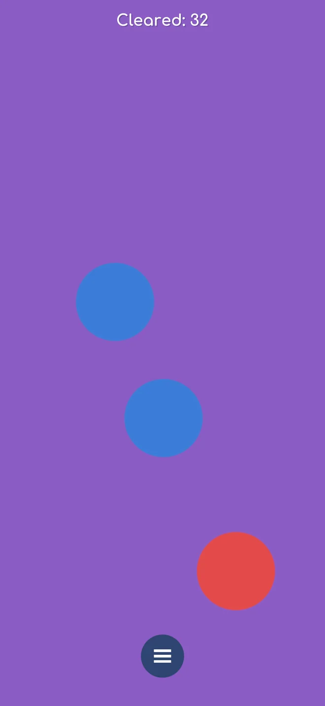 A board that is one purple band, with two blue dyes and a red dye floating in it