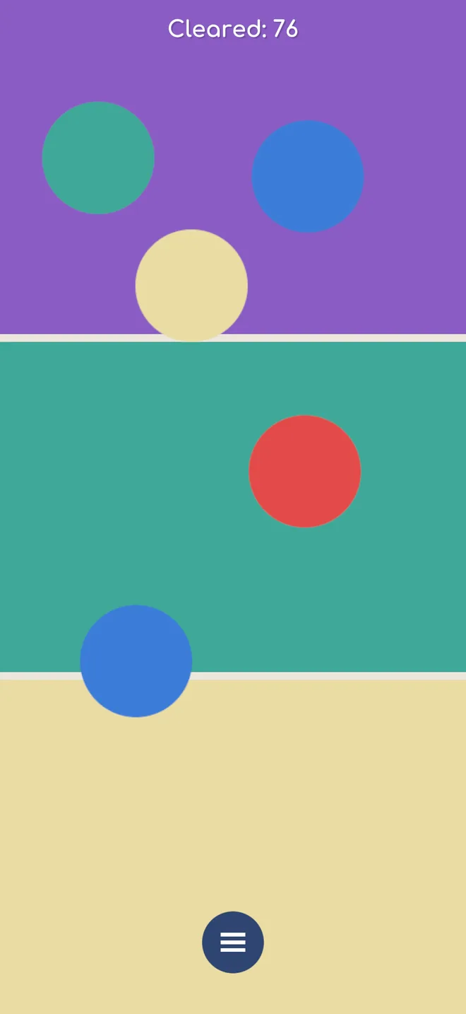 A board split into purple, teal and cream bands, with five dyes scattered across them
